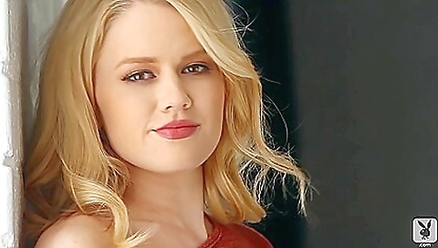 Beautiful blonde takes a look at her body and enjoys solo