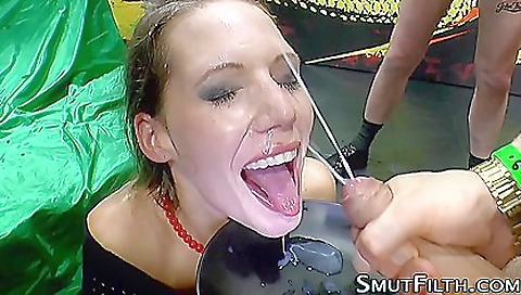 Brunette slut in stockings pissing and getting a face