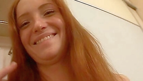 Lovely redhead maid with a nice body gets her caressed