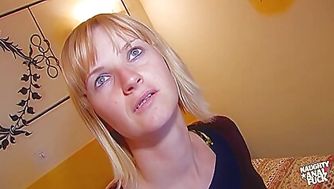 Blonde girl with small tits gets aroused and fingers her pussy