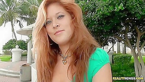 Hot redhead girl with a sexy face and beautiful body